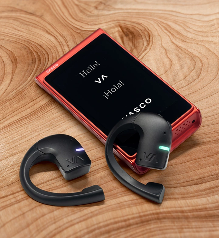 Man clicking settings of the translation headphones in Vasco V4 device