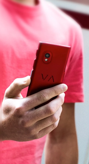 Rear view of the Vasco Translator V4 with side buttons clearly visible.